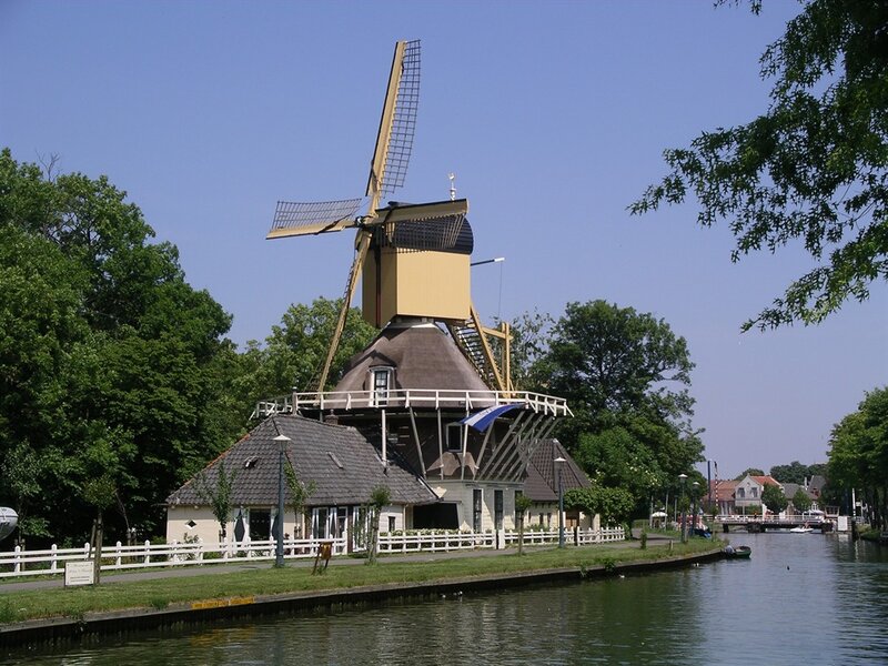 Windmill by Canal — Blue, Serene, Afternoon, Photograph, Trees