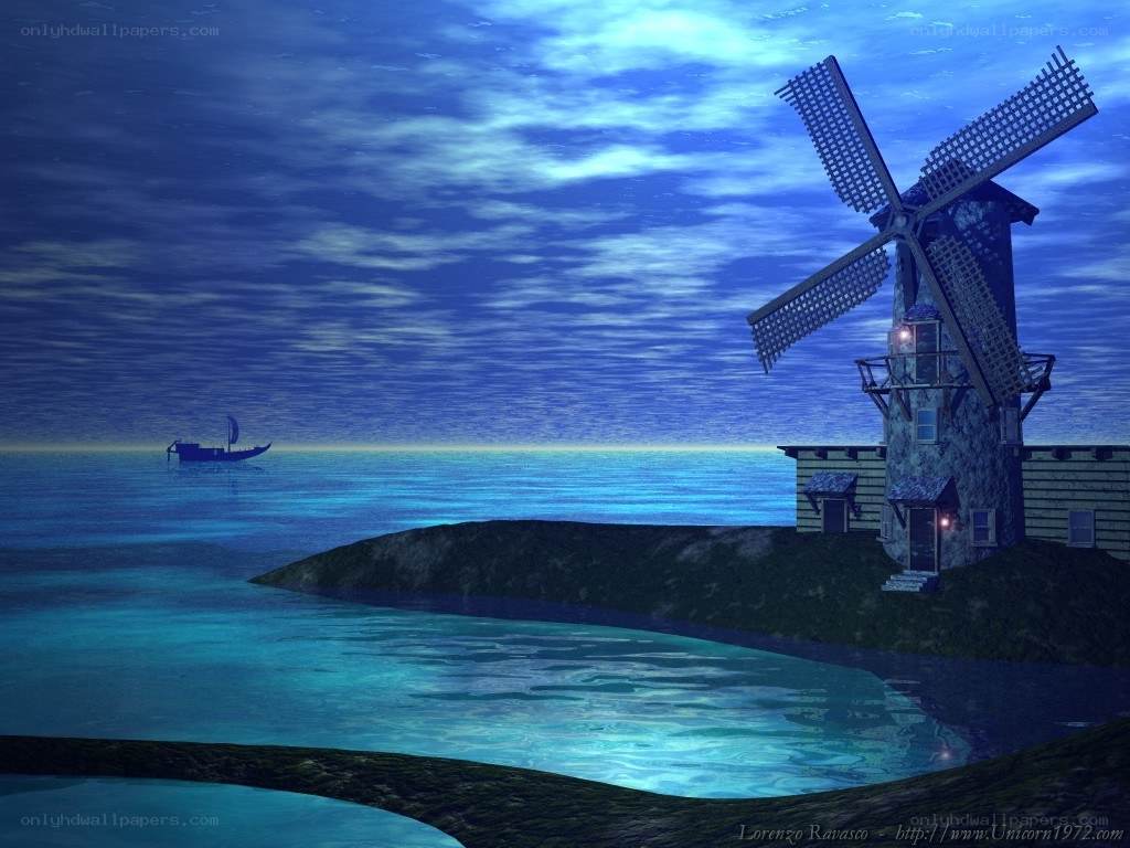 Windmill by the sea at night