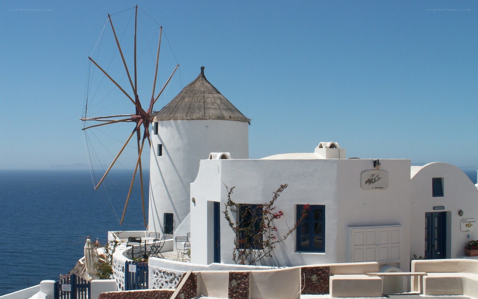 Windmill by the sea in Greece