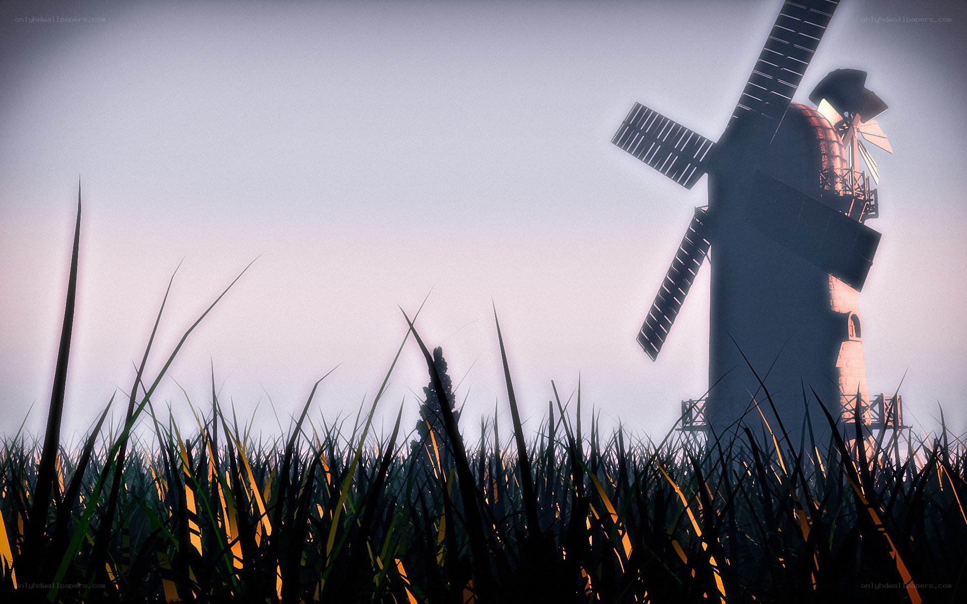 windmill in a field at dusk