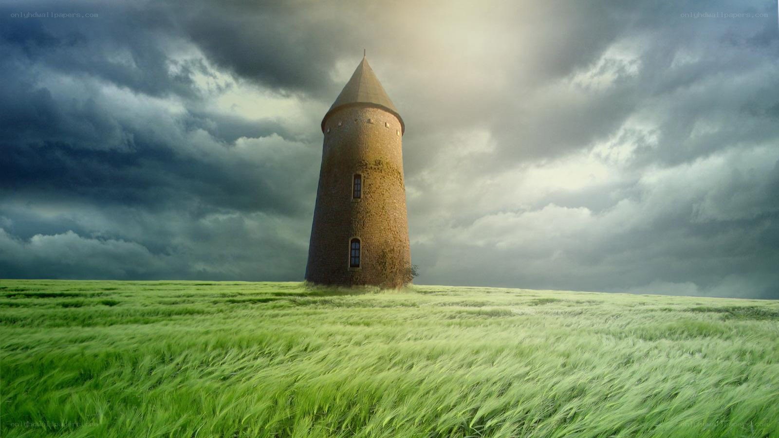 Windmill in a green field