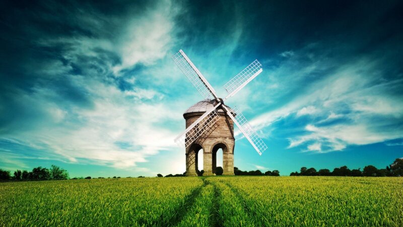 Windmill in a green field