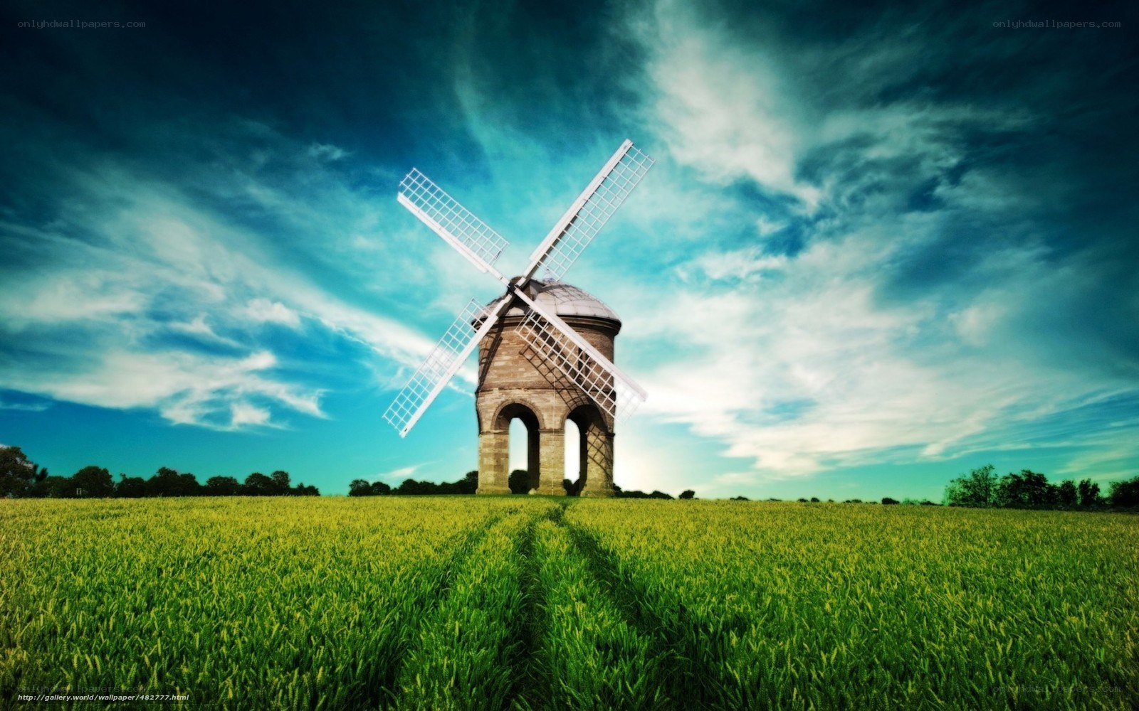 Windmill in a green field