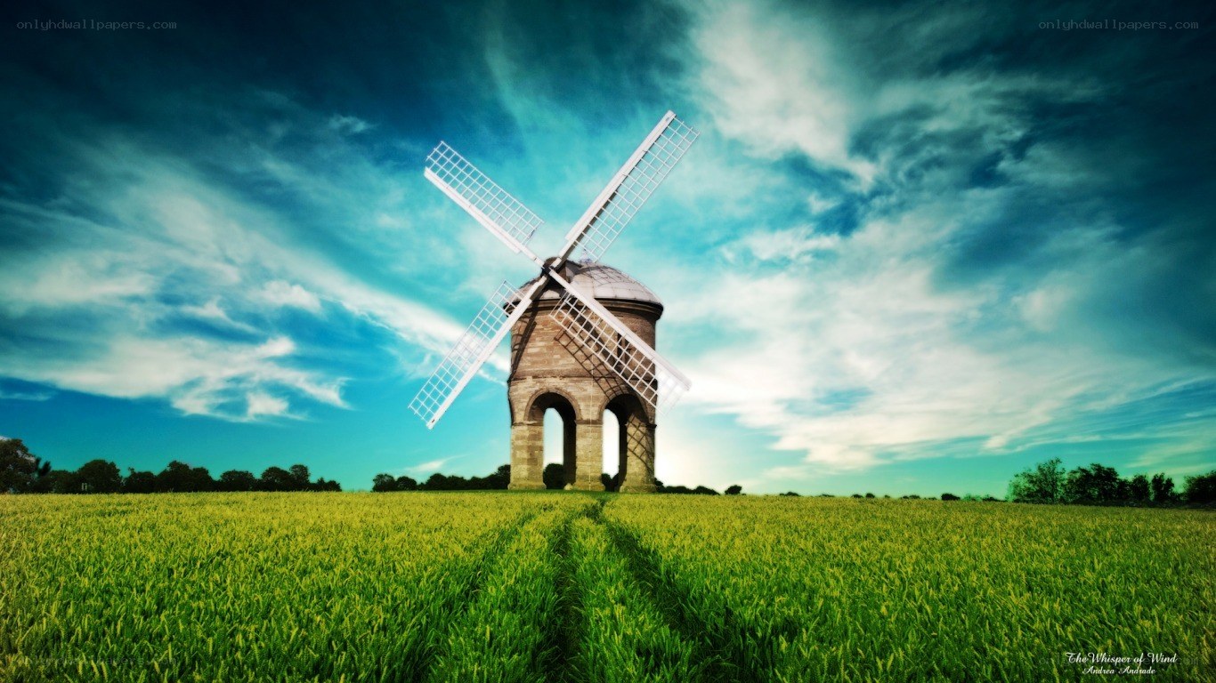 Windmill in a green field