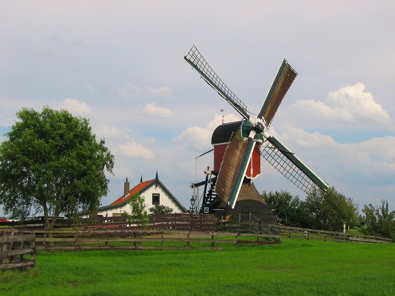 Windmill in a green field