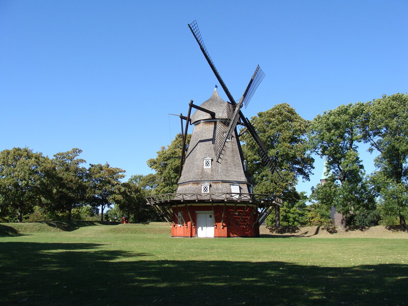 Windmill in a green park