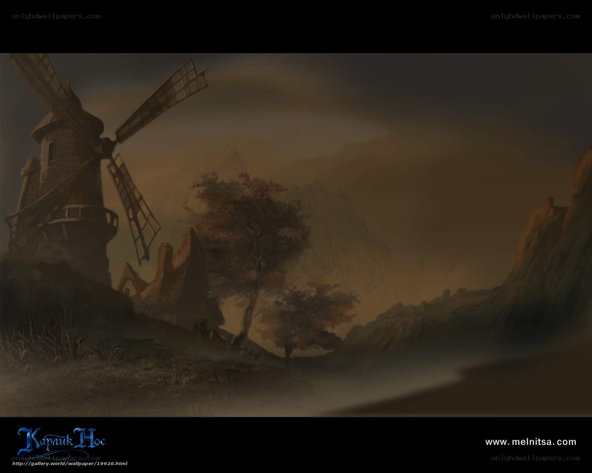 Windmill in a misty valley