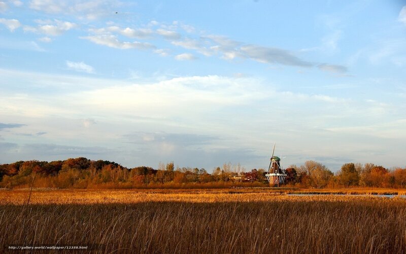 Windmill in autumn field