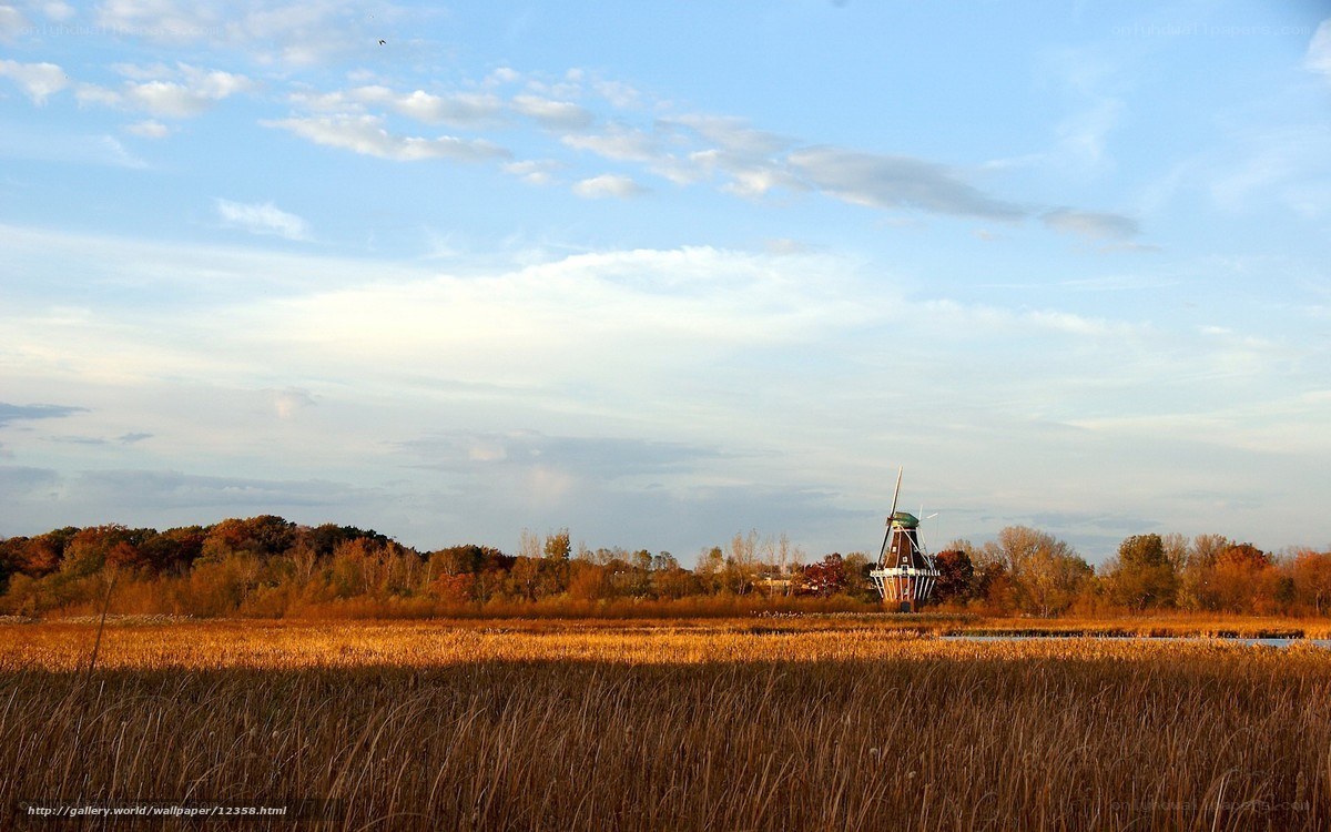 Windmill in autumn field