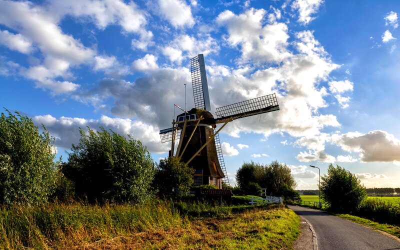 Windmill in Rural Landscape — Blue