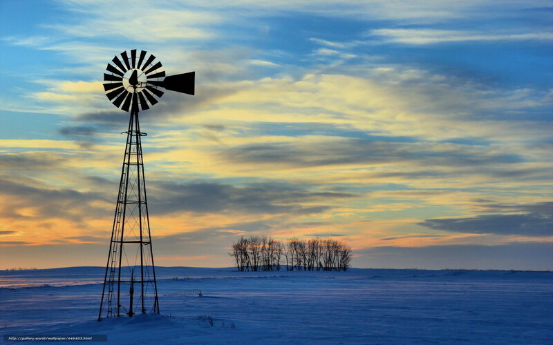 Windmill in snowy field