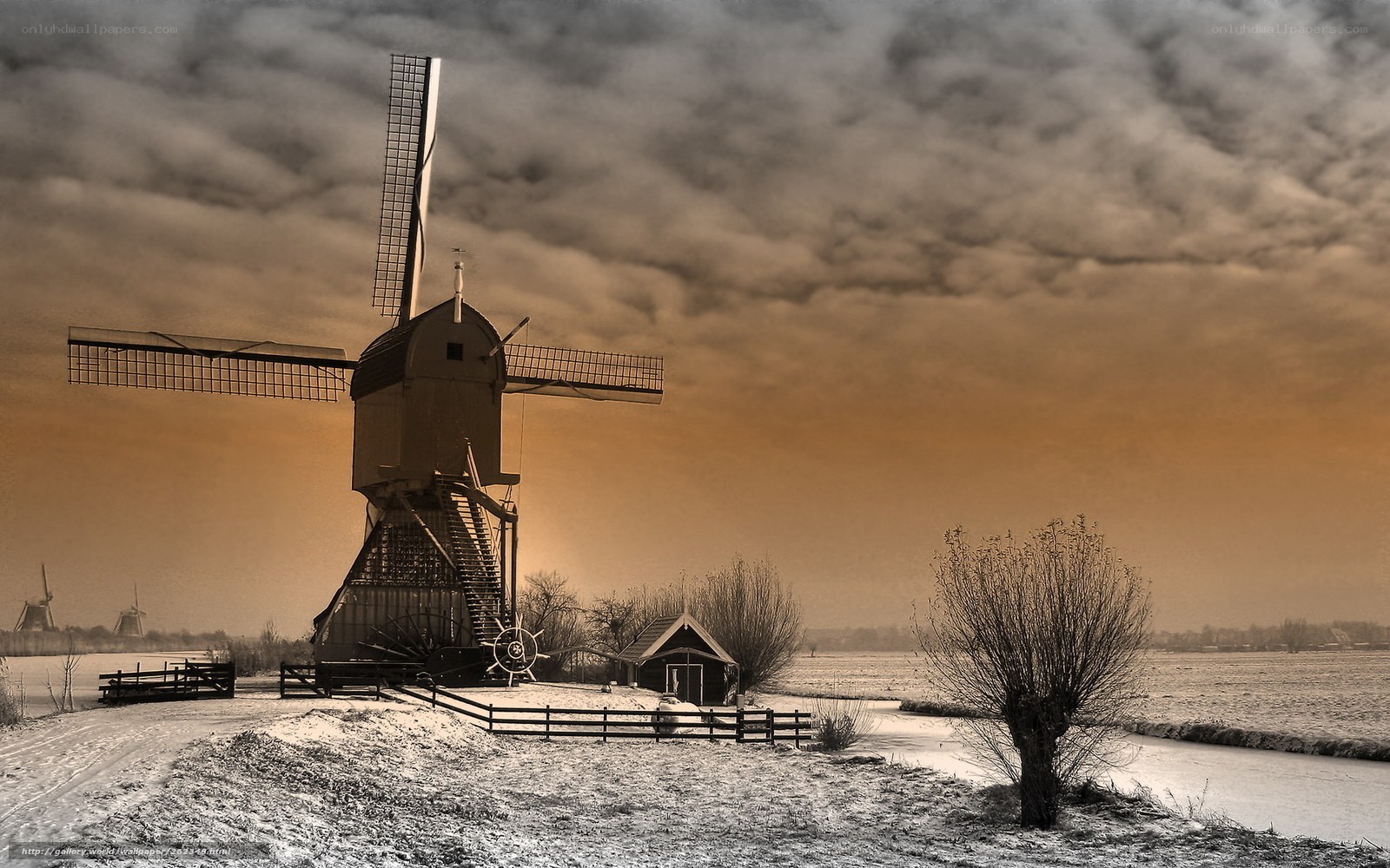 Windmill in snowy landscape