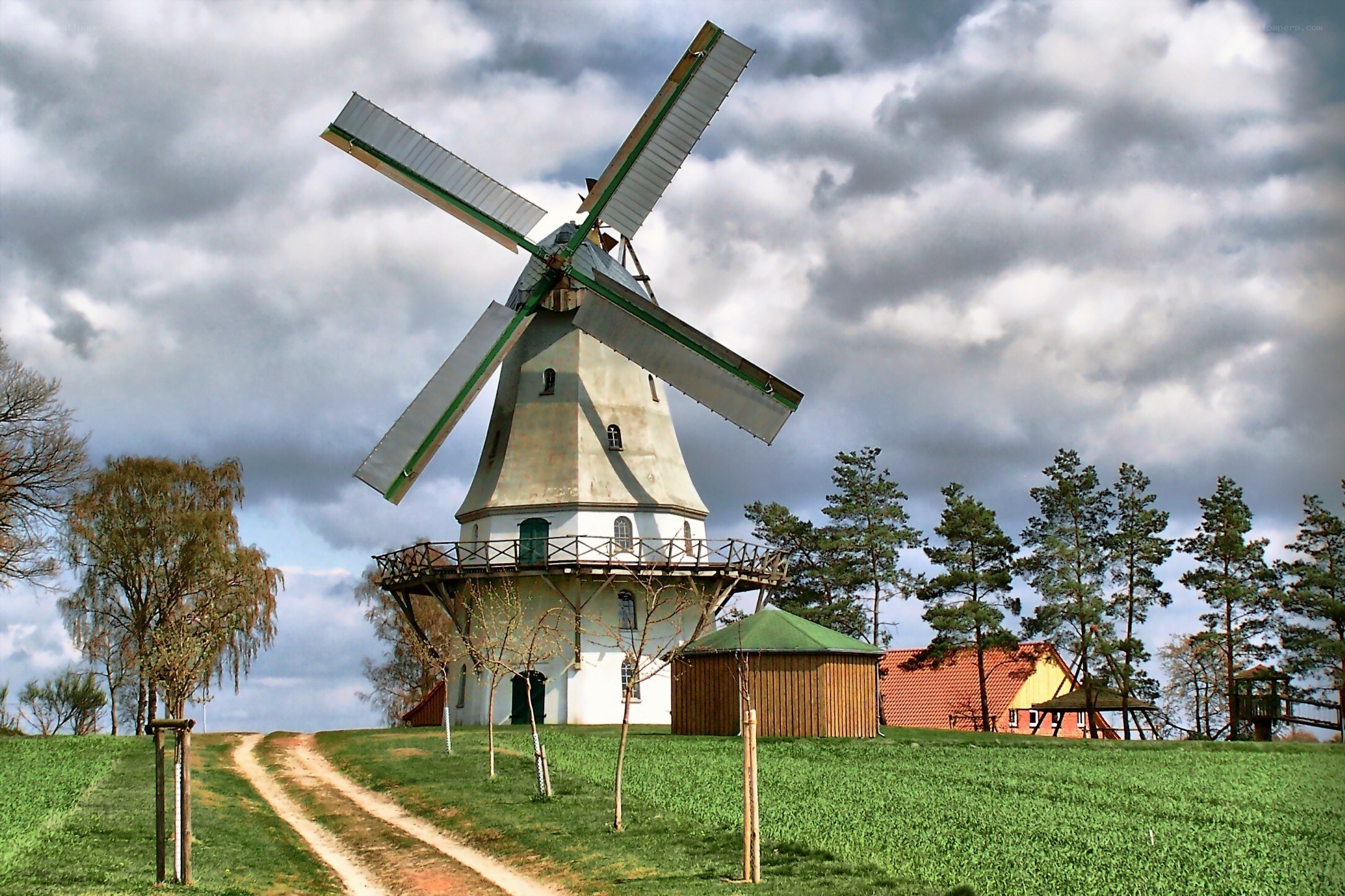 Windmill on a grassy hill