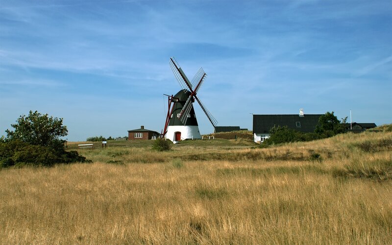 Windmill on a grassy hill