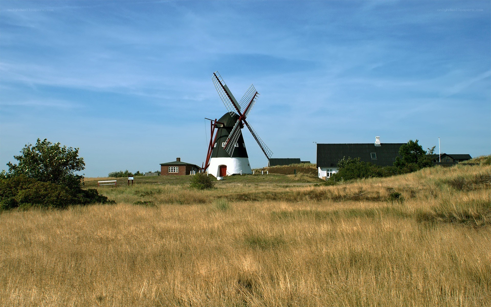 Windmill on a grassy hill