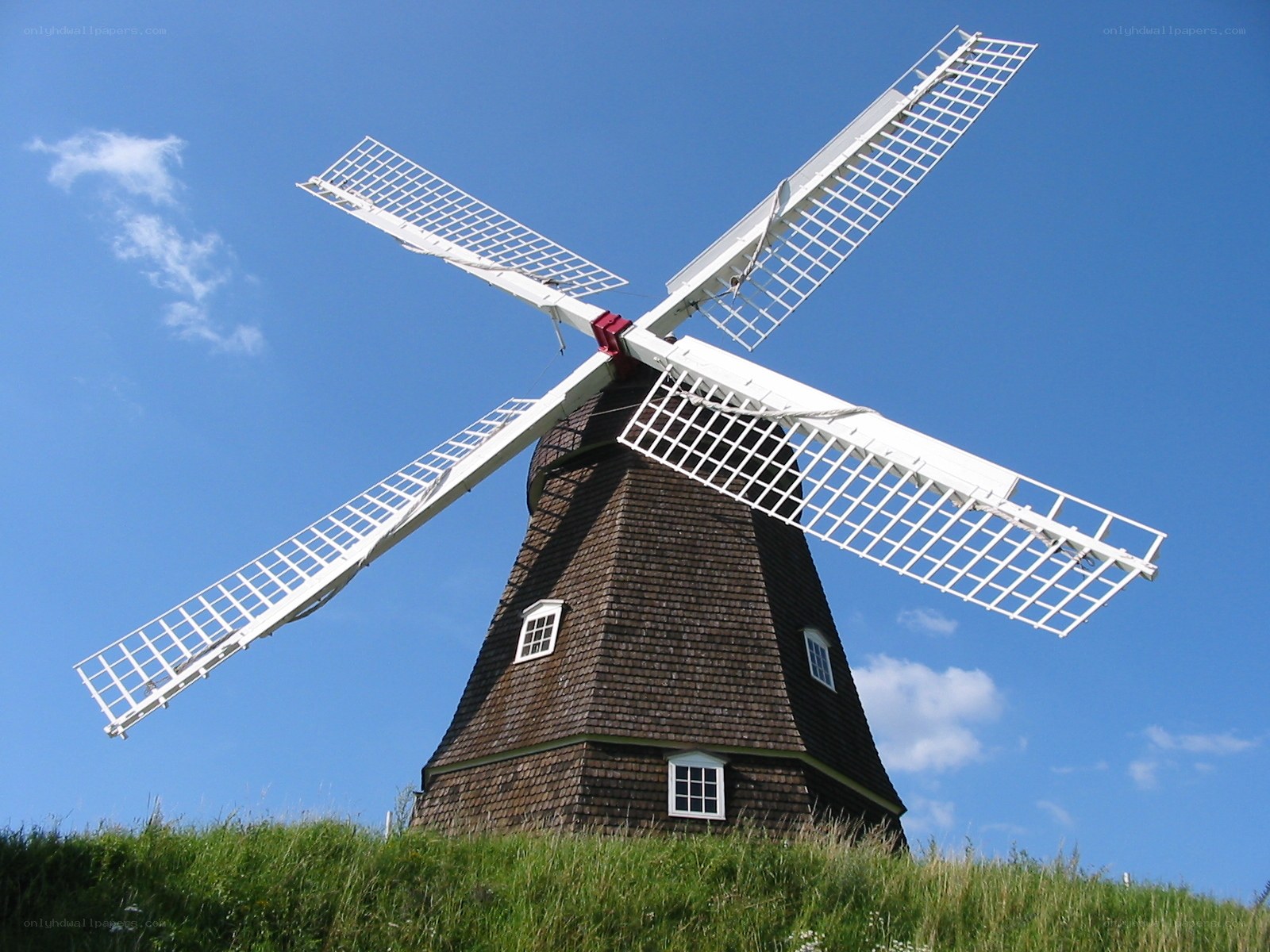 Windmill on a grassy hill