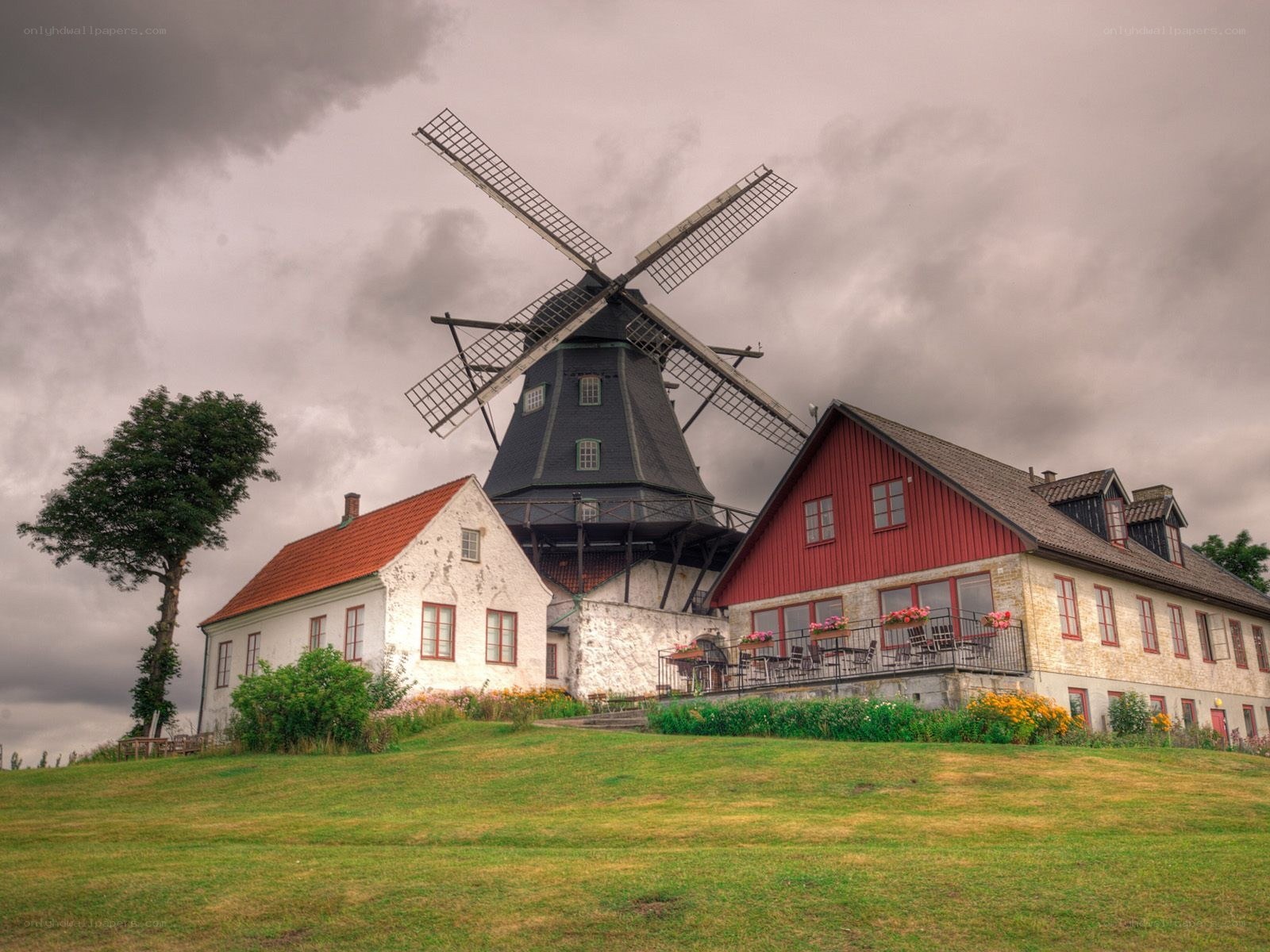 Windmill on a grassy hill