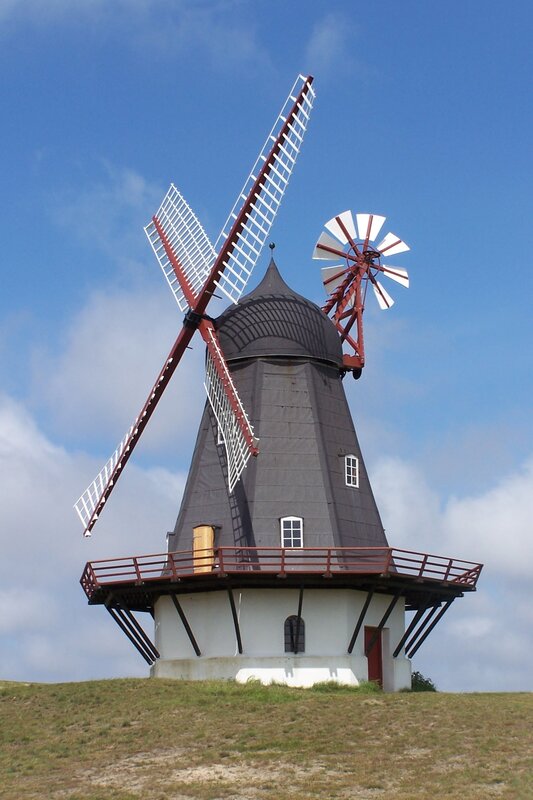 Windmill on a grassy hill