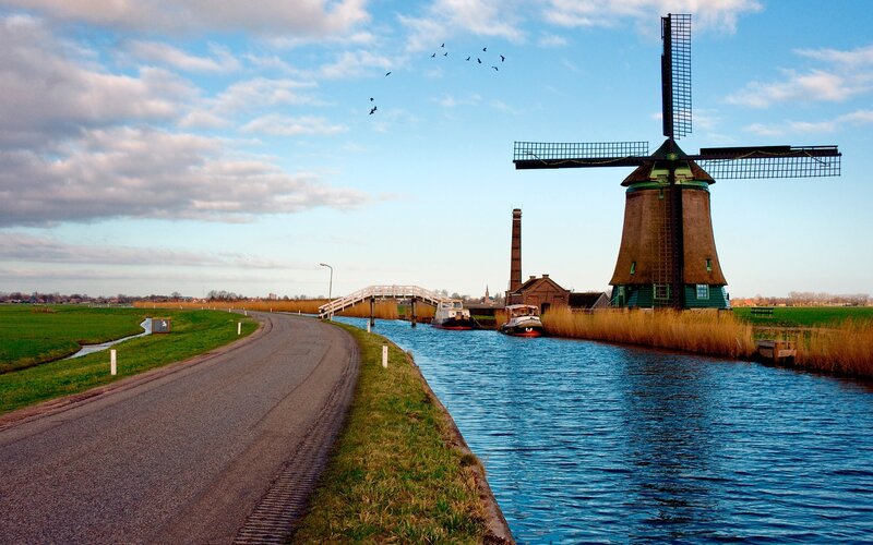 Windmill on Canal — Blue, Serene, Afternoon