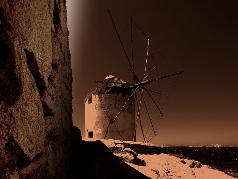 Windmill on Rocky Shore — Brown
