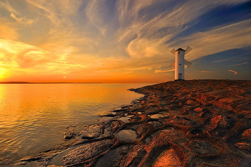Windmill on Rocky Shore