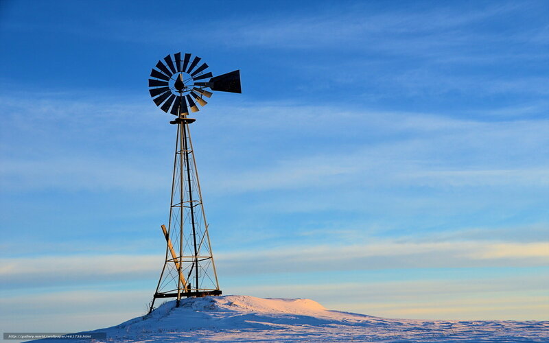 Windmill on snowy hill