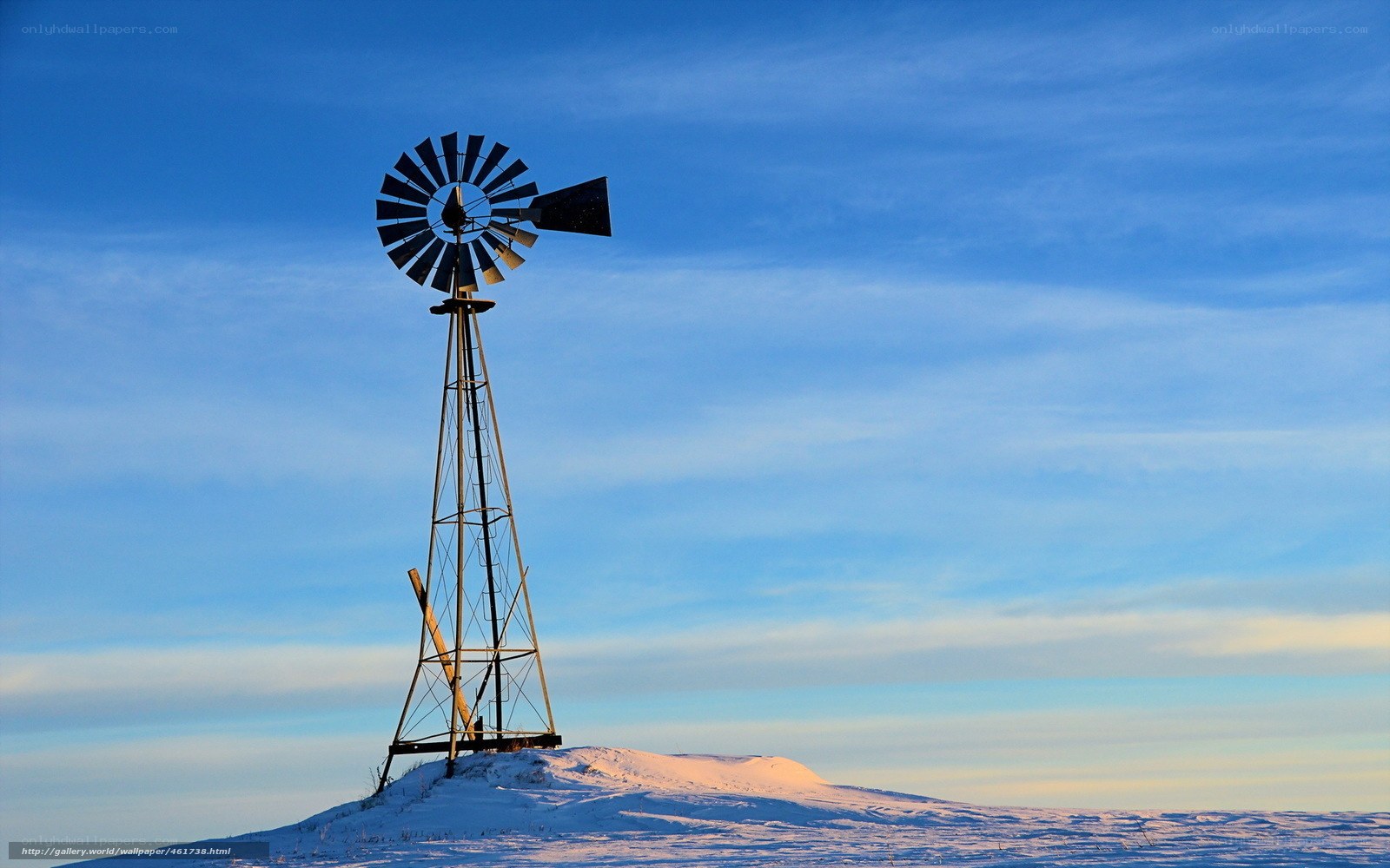 Windmill on snowy hill