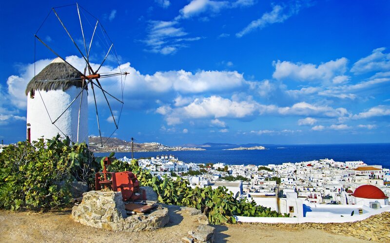 Windmill Overlooking Town — Blue, Serene, Afternoon