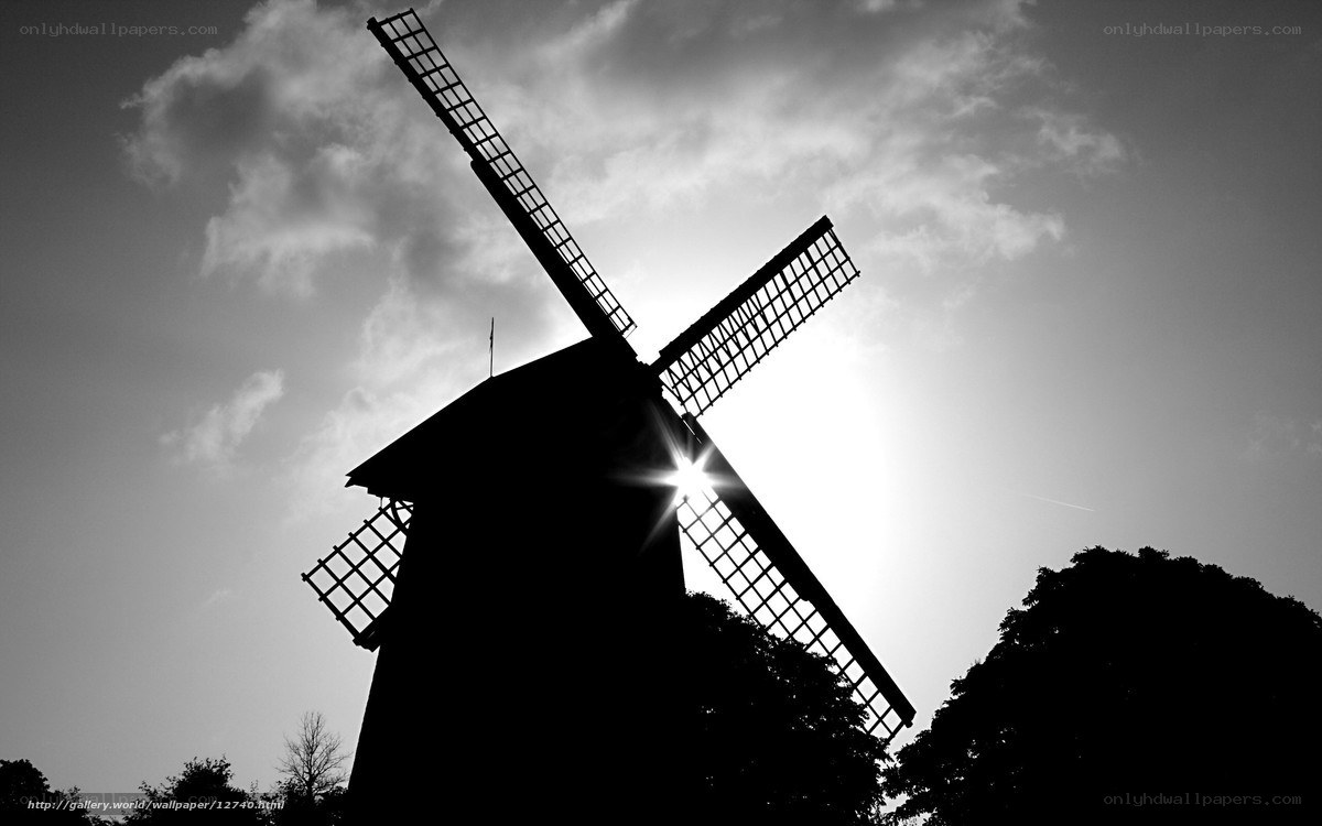 Windmill silhouette at sunset