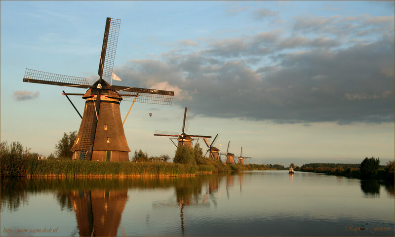 Windmills Along a Canal — Blue
