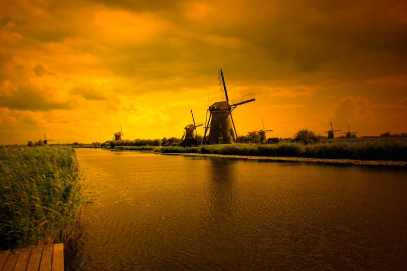 Windmills Along a Canal — Orange