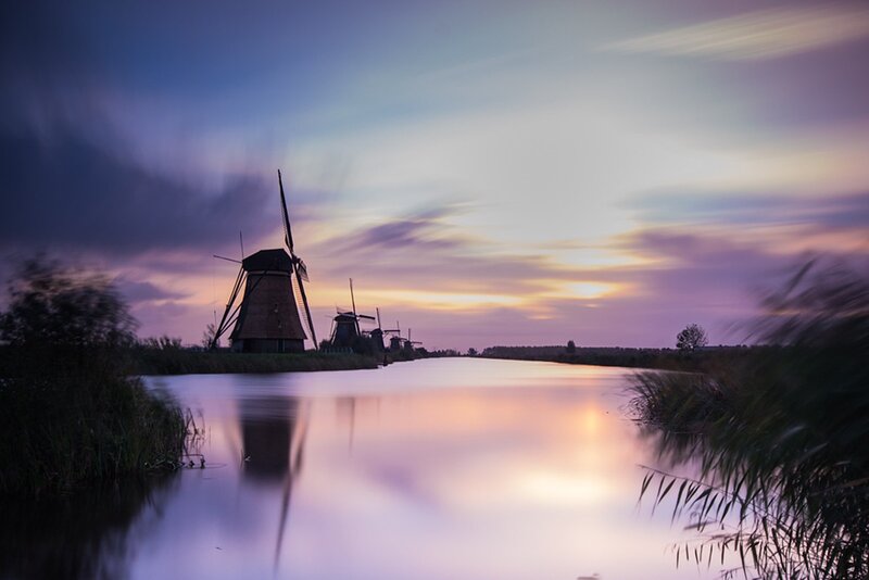 Windmills Along a Canal — Purple, Serene, Sunset