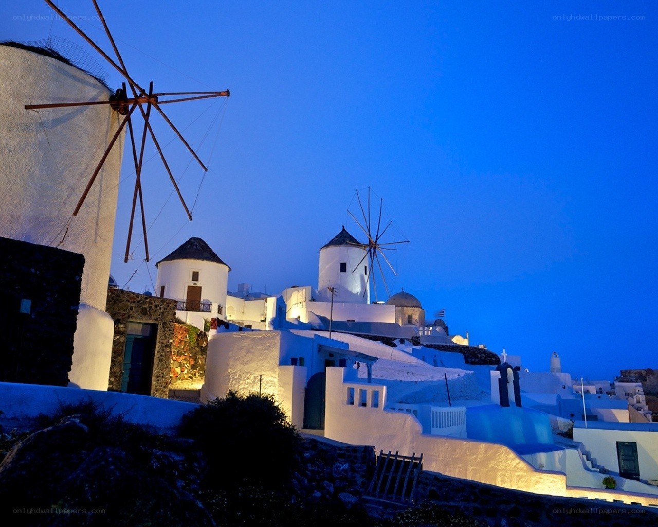 Windmills at dusk in Santorini