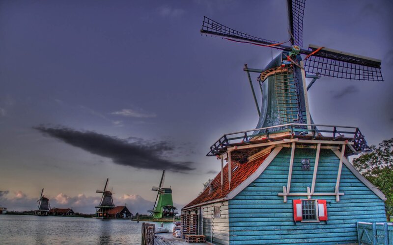 Windmills at dusk in the Netherlands