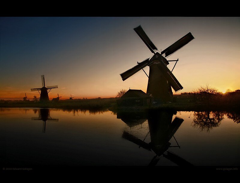 Windmills at sunset