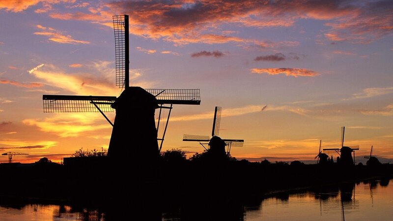 windmills at sunset