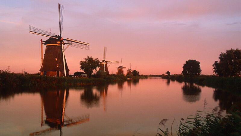 Windmills at sunset in the Netherlands