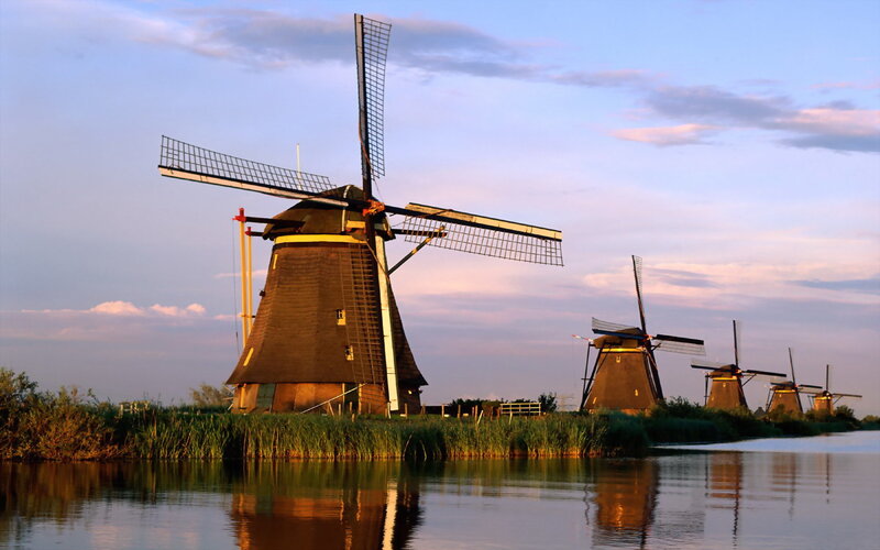 Windmills at sunset in the Netherlands