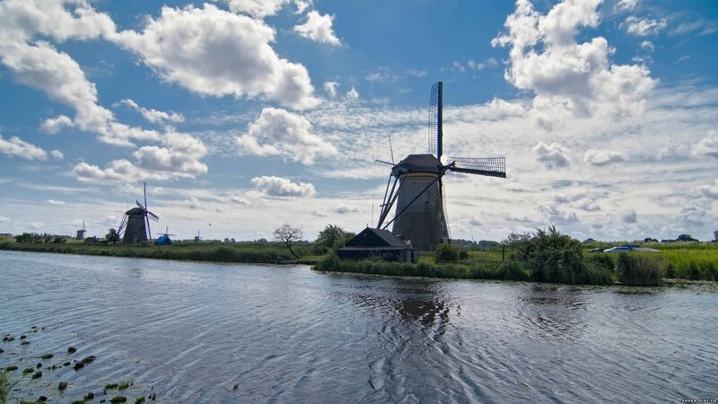 Windmills by a canal in the Netherlands