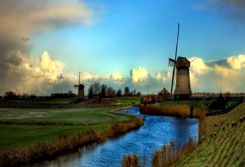 Windmills by a canal in the Netherlands