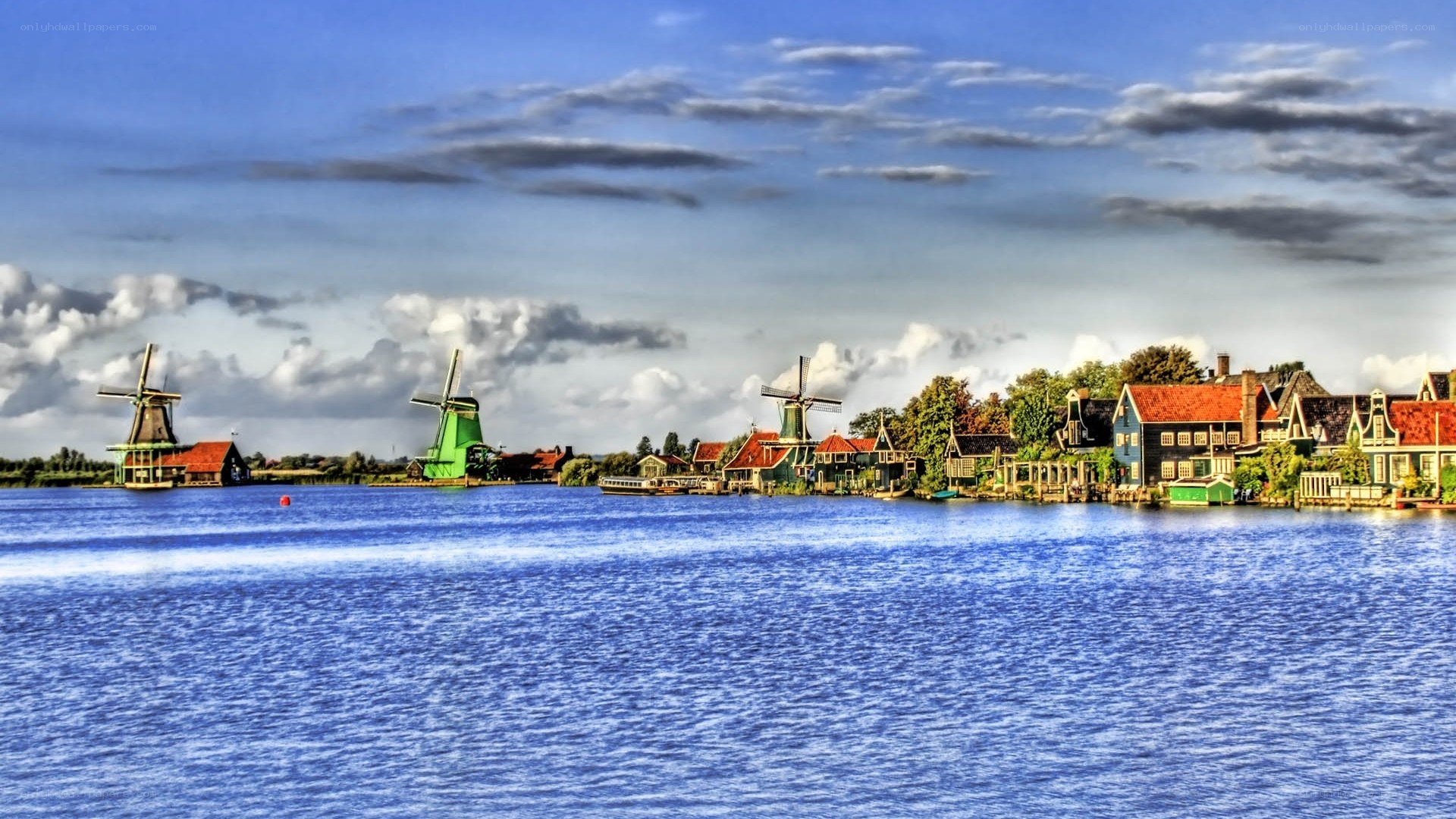 Windmills by the water