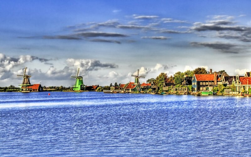 Windmills by the water