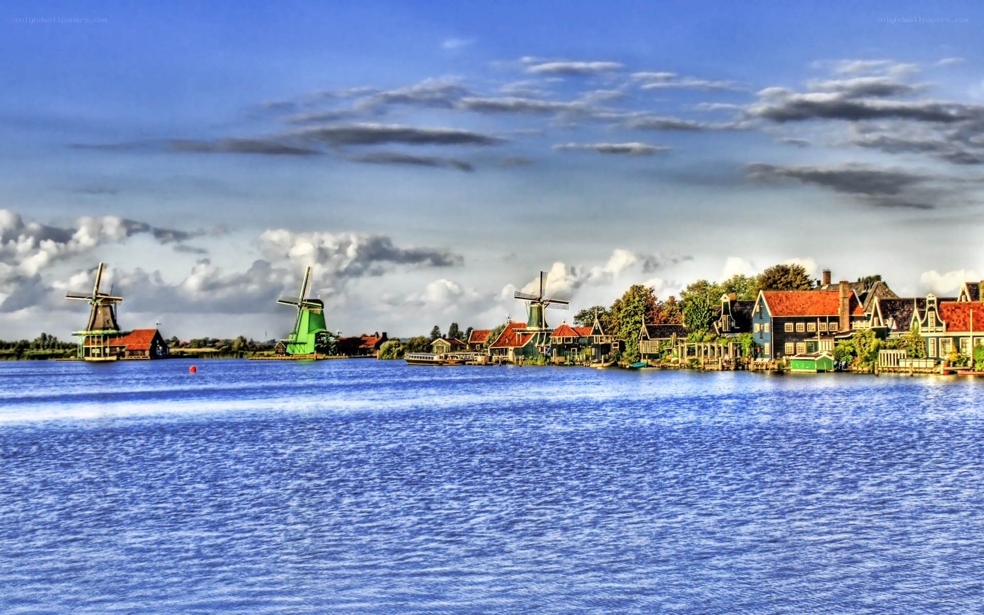 Windmills by the water