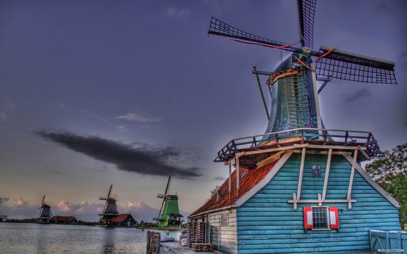 Windmills by the water