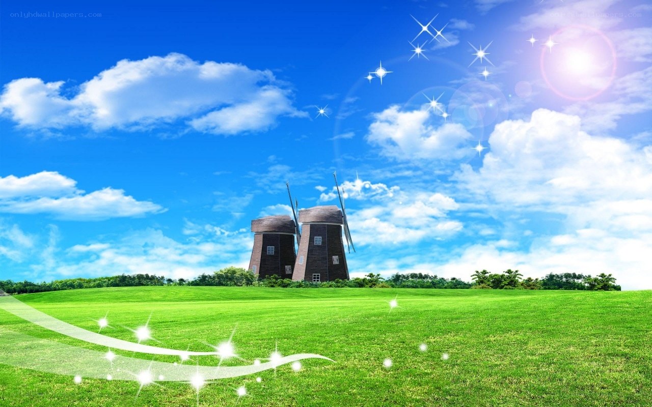 Windmills in a green field