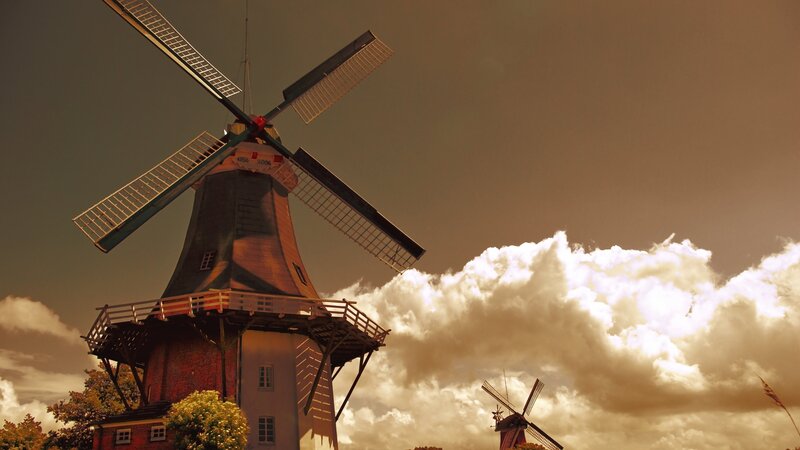 Windmills in Cloudy Sky