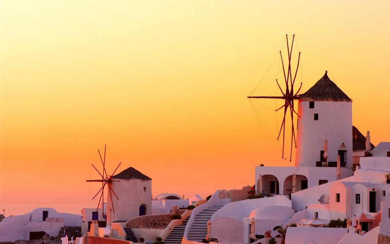 Windmills in Oia — Orange