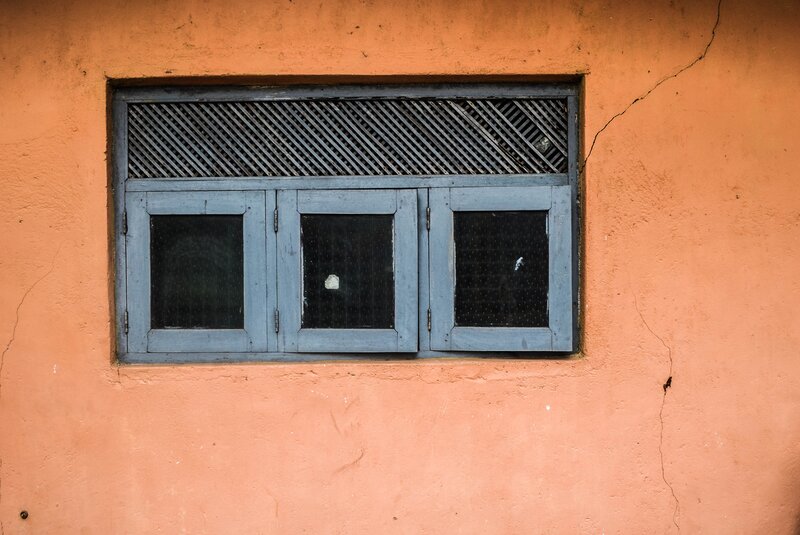 Window on Orange Wall — Dull