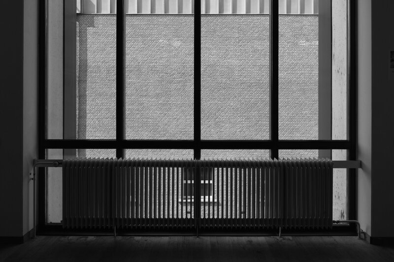 Window view of brick wall