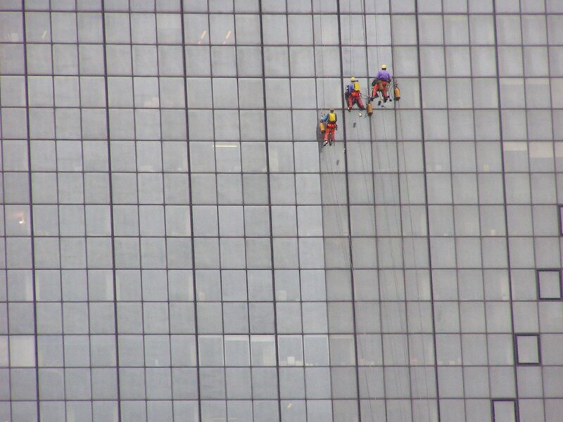 Window washers on skyscraper